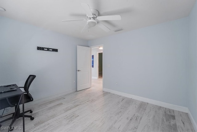 office featuring light hardwood / wood-style floors and ceiling fan