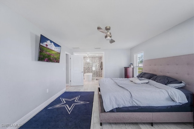 bedroom featuring ensuite bathroom, wood-type flooring, and ceiling fan