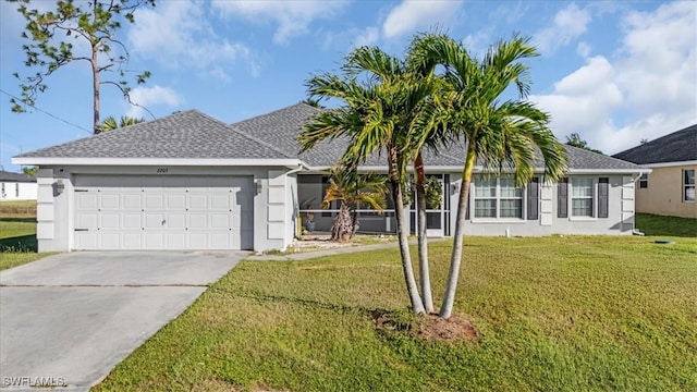 single story home with a front lawn and a garage