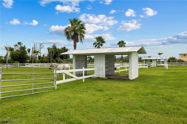 view of outbuilding featuring a rural view