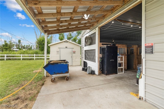 view of patio featuring a storage unit