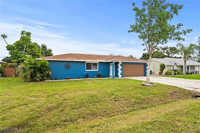 ranch-style home with a front yard and a garage