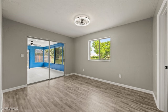 unfurnished bedroom with a closet and hardwood / wood-style floors