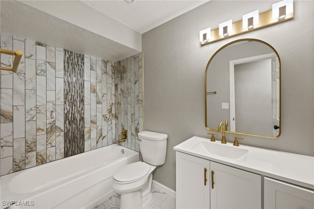 full bathroom featuring vanity, toilet, and tiled shower / bath combo