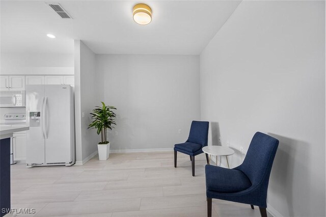 21566 Portrush Run, Estero, FL 33928 - living area with baseboards and recessed lighting