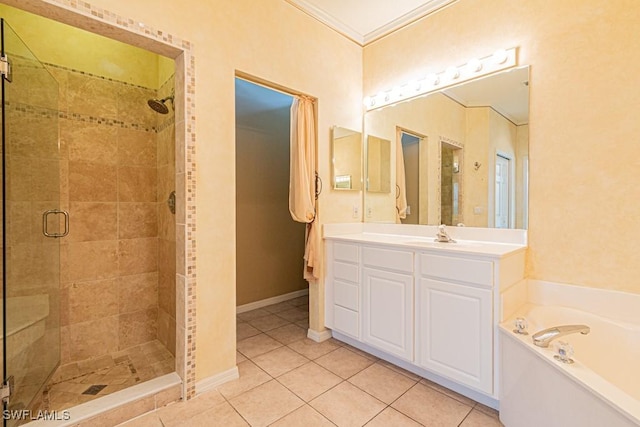 bathroom with tile patterned flooring, vanity, plus walk in shower, and crown molding