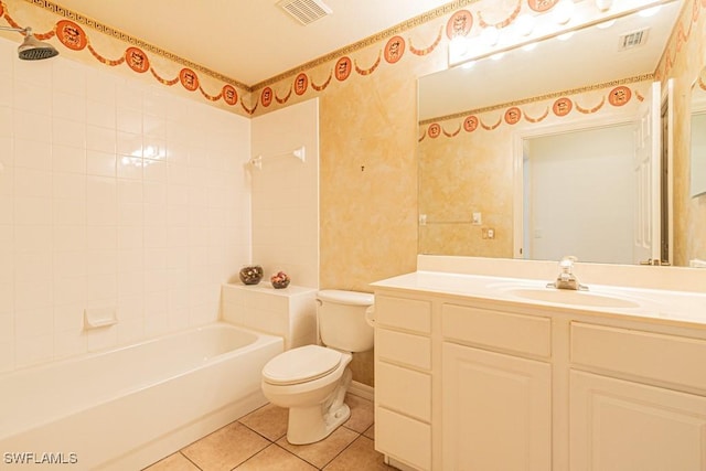 full bathroom featuring tile patterned flooring, shower / tub combination, vanity, and toilet