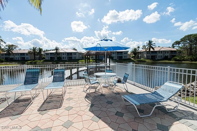 view of patio / terrace with a water view