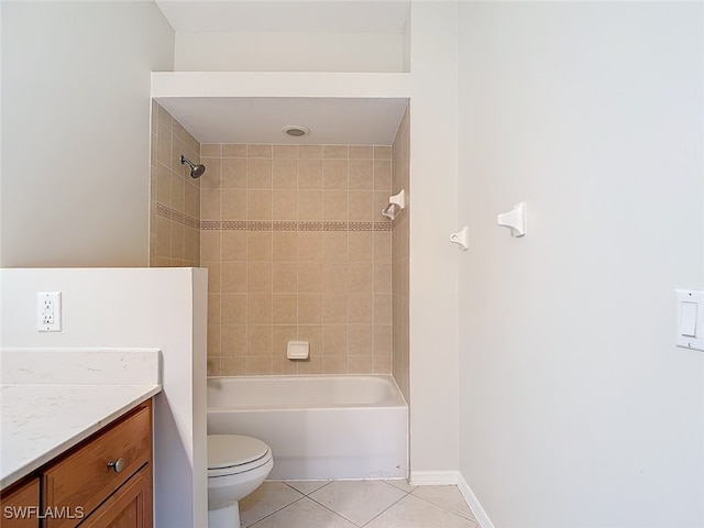 full bathroom with vanity, toilet, tile patterned flooring, and tiled shower / bath