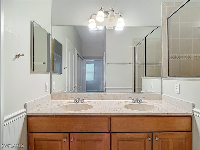 bathroom featuring vanity and walk in shower