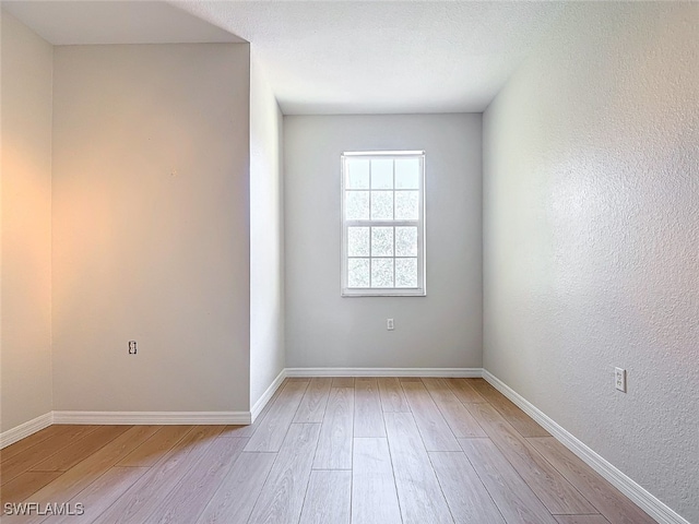 empty room featuring light wood-type flooring