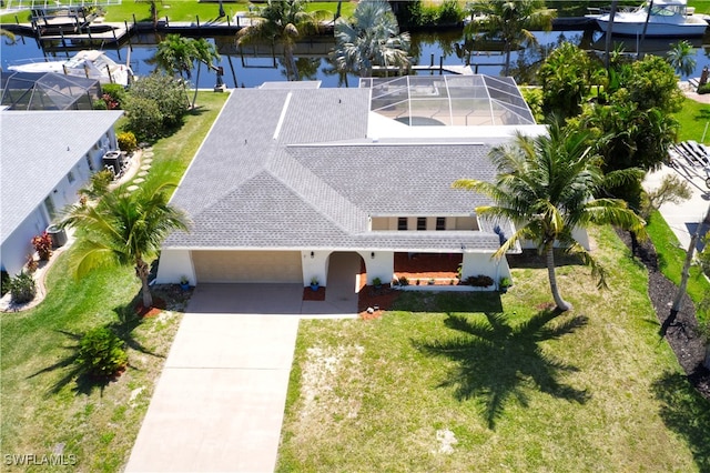 birds eye view of property featuring a water view