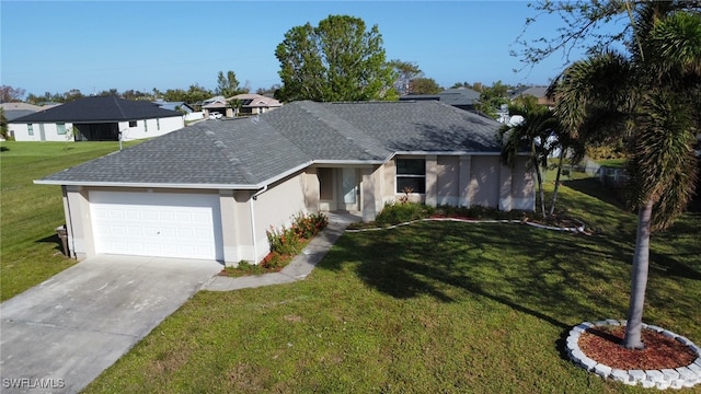 single story home featuring a front lawn and a garage