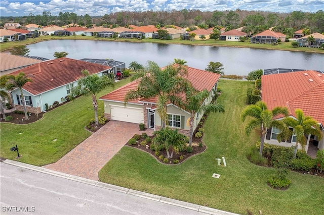 bird's eye view with a water view