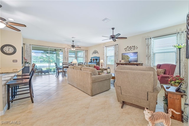 living room featuring light tile patterned floors