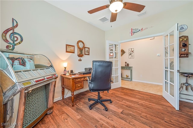 office with french doors, wood-type flooring, and ceiling fan