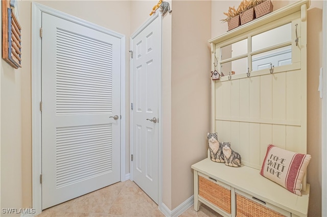 mudroom featuring light tile patterned floors