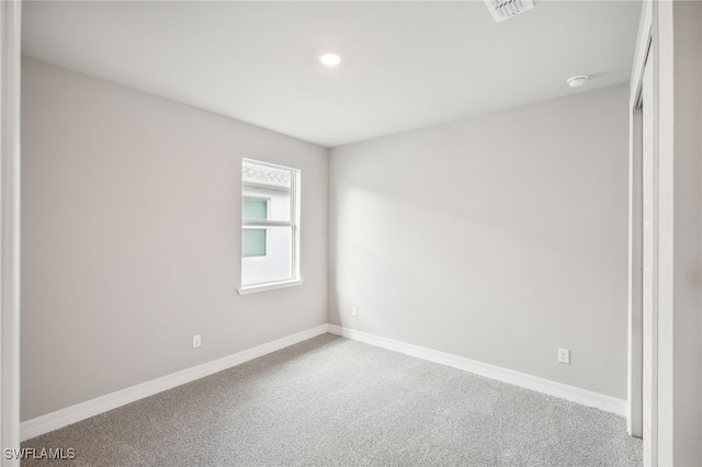 view of carpeted spare room