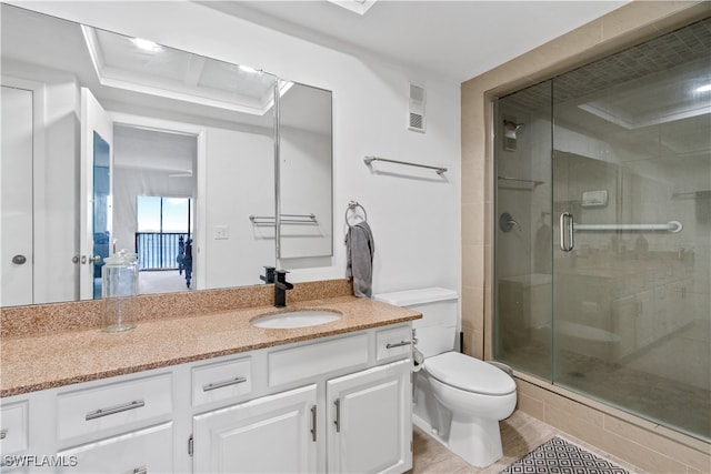 bathroom with vanity, wood-type flooring, toilet, and walk in shower