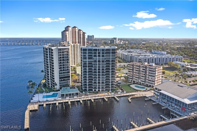 birds eye view of property featuring a water view