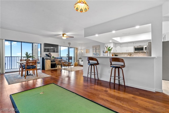 interior space featuring light hardwood / wood-style flooring and plenty of natural light