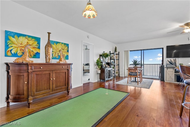 interior space featuring hardwood / wood-style floors and ceiling fan