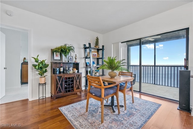 dining area with dark wood-type flooring