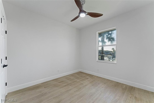 unfurnished room with ceiling fan and light wood-type flooring