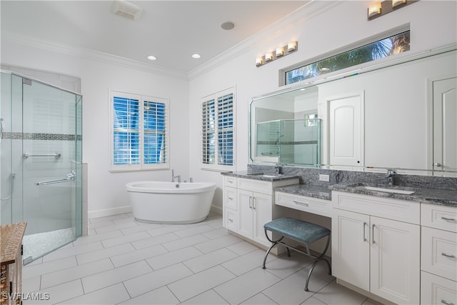 bathroom featuring vanity, ornamental molding, shower with separate bathtub, and tile patterned floors