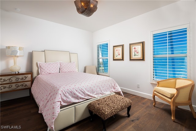 bedroom featuring dark hardwood / wood-style floors