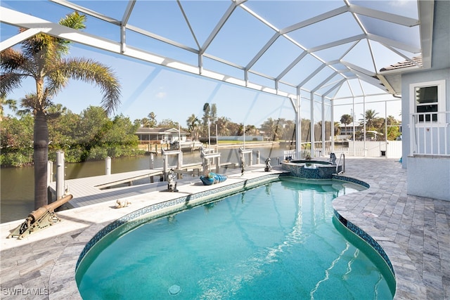 view of swimming pool featuring a patio, an in ground hot tub, a water view, and glass enclosure