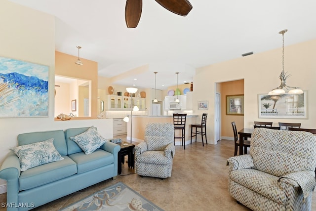 living room featuring ceiling fan