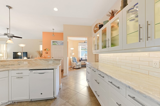 kitchen featuring ceiling fan, dishwasher, backsplash, decorative light fixtures, and white cabinets