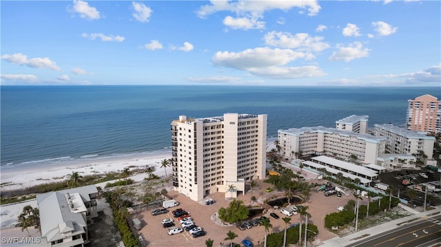 drone / aerial view with a view of the beach and a water view