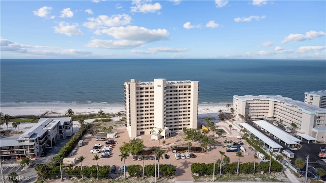 bird's eye view with a view of the beach and a water view