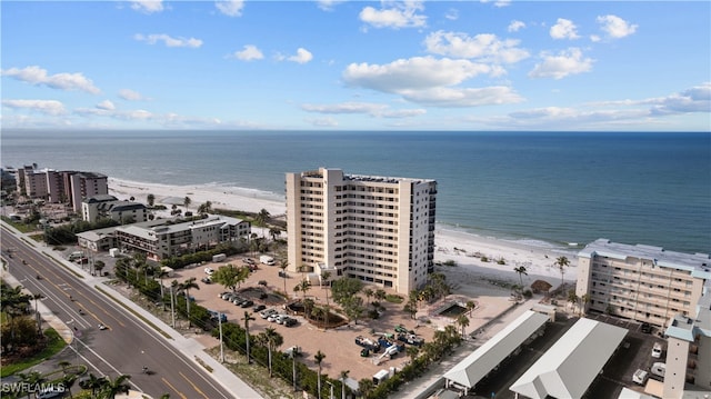 bird's eye view with a beach view and a water view