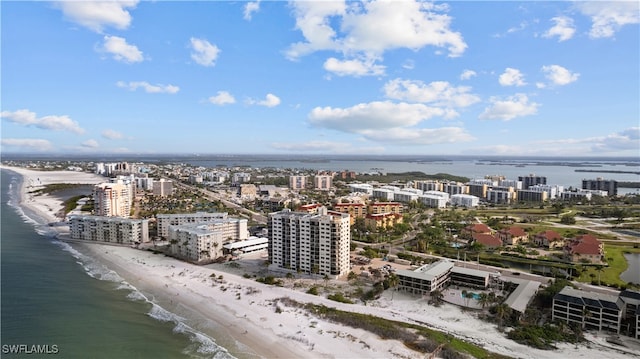 aerial view featuring a water view and a view of the beach