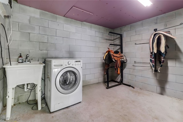 laundry room with separate washer and dryer