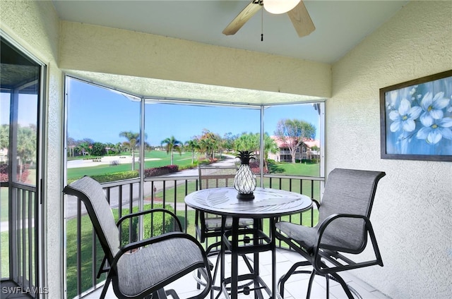 sunroom / solarium with ceiling fan