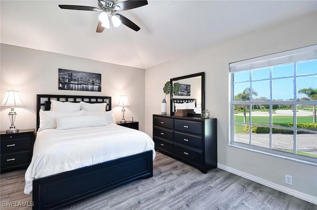 28080 Cavendish Ct Unit 2007, Bonita Springs, FL 34135 - bedroom featuring lofted ceiling, light wood finished floors, and a ceiling fan