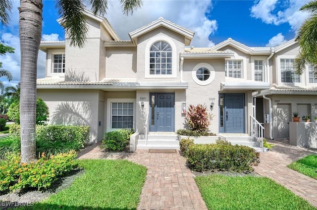 28080 Cavendish Ct Unit 2007, Bonita Springs, FL 34135 - view of property featuring stucco siding