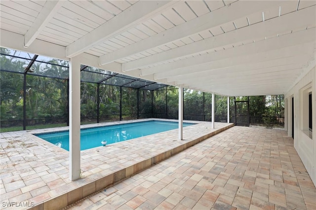 8531 Yorkshire Ln, Fort Myers, FL 33919 - outdoor pool featuring a patio and glass enclosure
