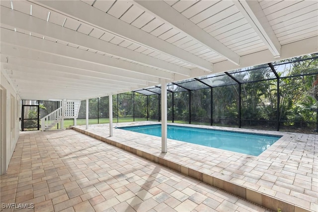 8531 Yorkshire Ln, Fort Myers, FL 33919 - swimming pool with stairway, a patio, and glass enclosure