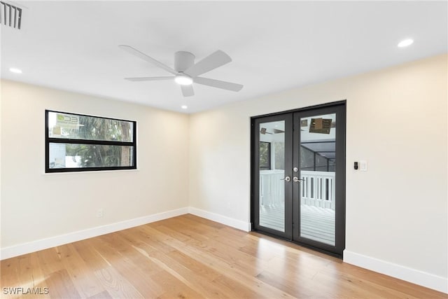 8531 Yorkshire Ln, Fort Myers, FL 33919 - empty room featuring french doors, baseboards, light wood-type flooring, recessed lighting, and ceiling fan