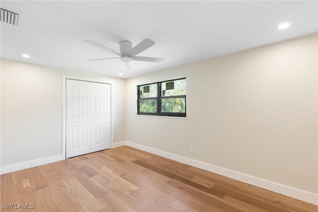 8531 Yorkshire Ln, Fort Myers, FL 33919 - unfurnished bedroom with baseboards, light wood-type flooring, recessed lighting, a closet, and ceiling fan