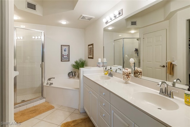 bathroom with vanity, tile patterned floors, and shower with separate bathtub