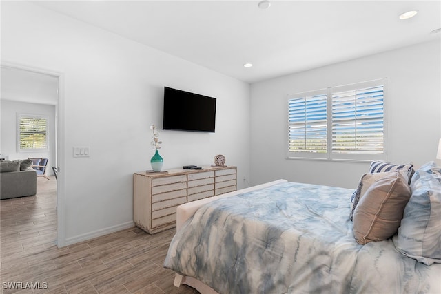 bedroom featuring light wood-type flooring