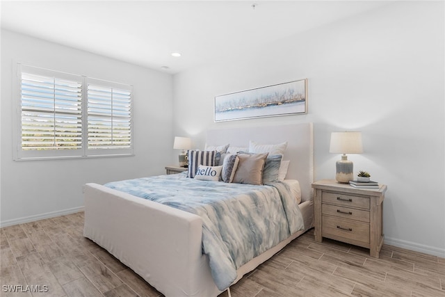 bedroom featuring light hardwood / wood-style floors