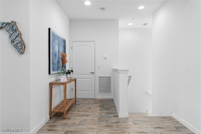 hallway with light wood-type flooring