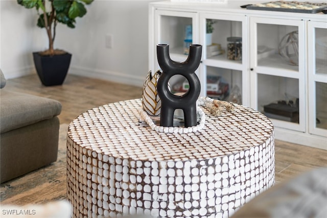 interior details featuring hardwood / wood-style flooring